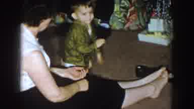 Nebraska (1957): A Little Child Playing With His Grandmother In Front Of All His