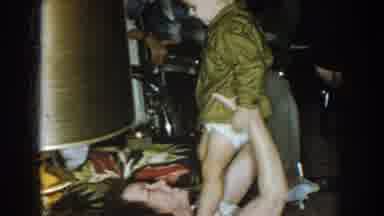 Nebraska (1957): A Granny Playing With A Baby On Diapers And Letting Him Sit down