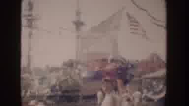 Disneyland California (1962): Woman Wearing Black Shirt Holds Baby Wearing White