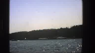 Denmark (1975): View Of Gray Boat In Calm Lake Water On A Sunny Day