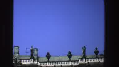Denmark (1975): View Of Dark Green Statues Against Blue Sky On A Clear Sunny Day