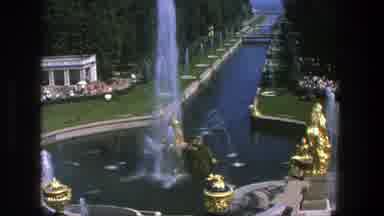 Denmark (1975): View Of Gold Water fountain And Green Trees On A Sunny Day