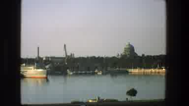 Denmark (1975): A Landscape Of A River With Some Big Ship Passing By At The Port