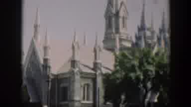 Wyoming (1951): Portion Of Large White And Gray Building With Turrets Near Trees