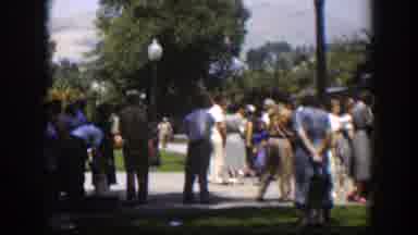 Wyoming (1951): Person Wearing Blue Pants Walks Past Gray Memorial Statue On A