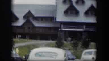Wyoming (1951): View Of Brown House And Green Trees On A Cloudy Day
