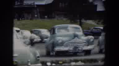 Wyoming (1951): Old Footage Of Era Vehicles In A Large Lodge Parking Lot