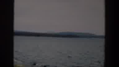 Wyoming (1951): View Of Blue Lake Water And Trees On A Clear Day