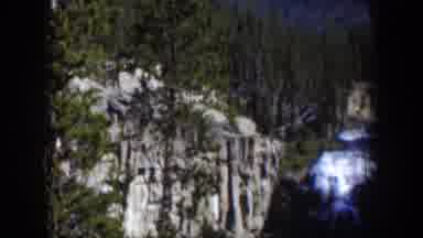 Wyoming (1951): A Waterfall At Night In The Woods Streaming Water Close Up