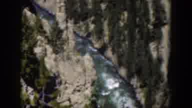 Wyoming (1951): View Of Mountain Green Trees And River On A Sunny Day