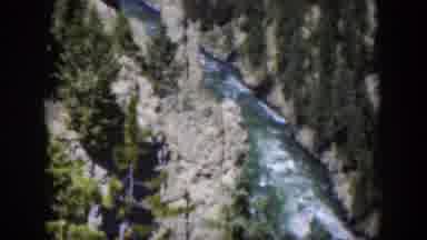 Wyoming (1951): View From Above Of Fast Moving River Rapids In A Landscape Of