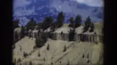 Wyoming (1951): Aerial Viewing Of Mountains Valleys And Forest From A Helicopter