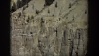 Wyoming (1951): Clear Blue Skye Spares Trees Pine Trees Rocky Mountain Cliffs