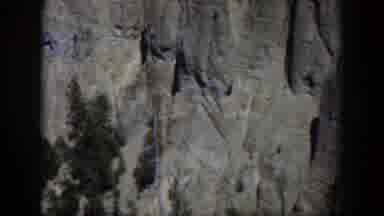 Wyoming (1951): View Of Gray Rocks And Green Trees On A Bright Sunny Day