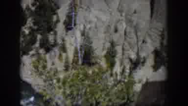 Wyoming (1951): Someone Shooting A Forest And A River From A Cliff Top