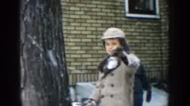 Michigan (1957): Children In Blue And Beige Hat And Coat Play On The Snow