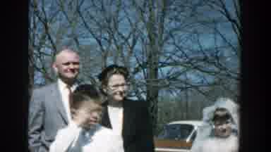 Michigan (1957): Standing In The Parking Lot Of A Church For First Holy Communion
