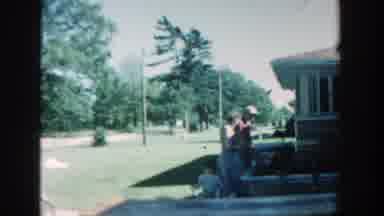 Michigan (1957): Child Walks With His Bicycle Around A House Surrounded By