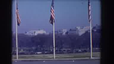 Washington DC (1960): Breeze Blows Flags As They Hang Tight On The Pole