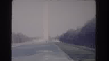 Washington DC (1960): A Gray Empty Road With Several Trees Around And End With