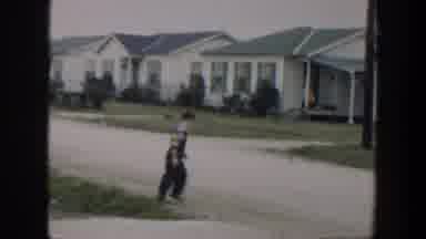 Cuba (1951): Old Video Footage Of A Child Running Down The Street In Blue Overalls