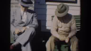 Cuba (1951): Two Men On Benches Passing Time Carving Wood Outside The House