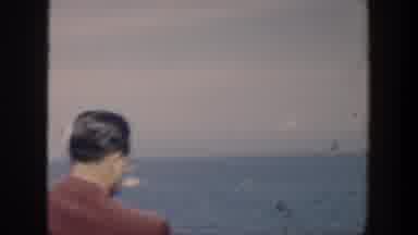 Cuba (1951): Man Feeds A Flying Bird