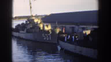 Cuba (1951): Two Large Stationary Ships On The Ocean Shores Viewed Together