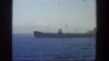 Cuba (1951): Long Ship Filmed From A Distance Across The Water On A Calm Sea