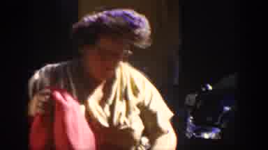 Cuba (1951): A Man In Suit Approaches An Old Woman To Help Out