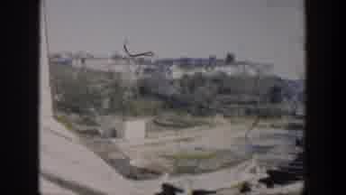 Cuba (1951): View Of White Buildings And Green Trees On A Clear Day