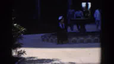 Cuba (1951): Lady Sitting On A Bench In The Shade In The Square While Other People