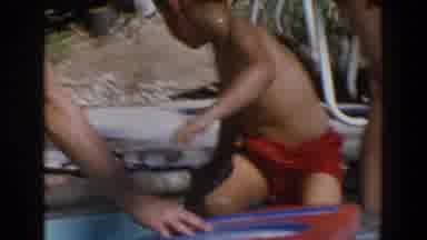 North Hollywood California (1962): Child Playing In The Pool During Summer Holiday