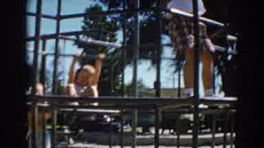 North Hollywood California (1962): Two Kids Playing On A Jungle Gym On A Sunny Day