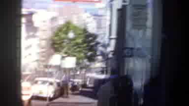 San Francisco California (1957): People Watching A Building Raising A Flag With