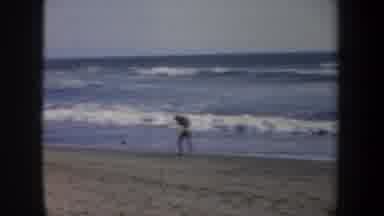 San Francisco California (1957): A Surfer Riding A Wave Then Someone Running And