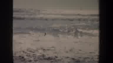 San Francisco California (1957): Dark Ocean Foamy Waves Ripple Up Wet Sandy Beach