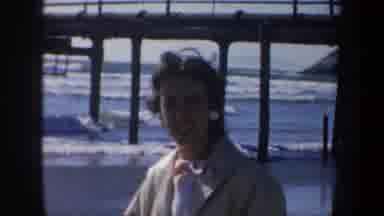 San Francisco California (1957): A Human Being On The Peach While Animals Inside