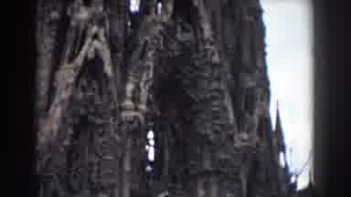Barcelona Spain-1959: Camera Pans Across Tall Building Ornate Details On Stone