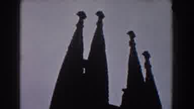 BARCELONA SPAIN-1959: Silhouetted Church Spires Against Pale Sky