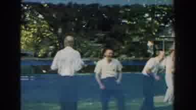 Michigan (1959): A Group Of Men And Women In Sportswear Having Fun