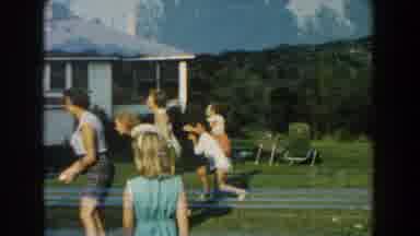 Michigan (1959): During A Sunny Day The Whole Family Has Fun In The Garden