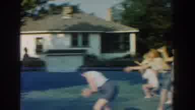 Michigan (1959): Group Of Family And Friends Enjoy Lively Egg Toss Game In Large