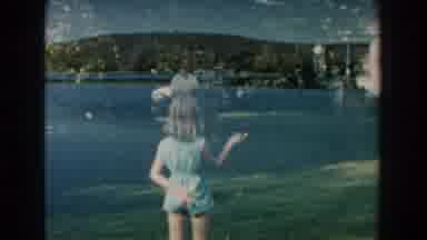 Michigan (1959): Family Gathered Outdoors On Lawn During The Summer Playing Catch