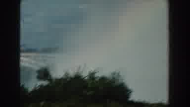 Michigan (1959): View Of Rainbow And Trees On A Bright Sunny Day