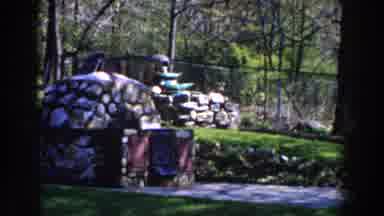 Michigan (1959): Fountain At Garden Zoo With Grass And Stones Fences Sculpture