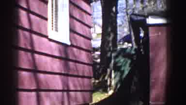 Michigan (1959): View Of Red And White House With Green Tree On A Bright Sunny Day