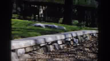 Michigan (1959): Scanning Of House Red And White House And Grass-Covered Backyard