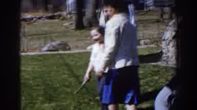Michigan (1959): Group Of Families Enjoying A Happy Day With Their Kids Who Play