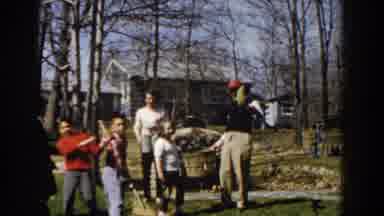Michigan (1959): Large Family Doing Yard Work With Rakes And Baskets In Front Of
